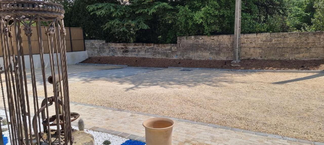 Le Petit Eden Saint-Quentin-la-Poterie Exterior foto